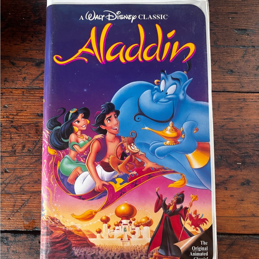 Disney Purple and Orange Magical Genie Figure